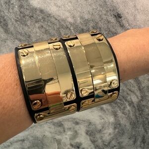 BCBGMAXAZRIA shiny gold and sueded leather metal cuff bracelet